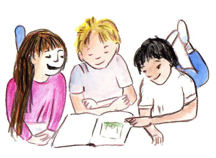 Hier sind Kinder beim Lesen zu sehen.
